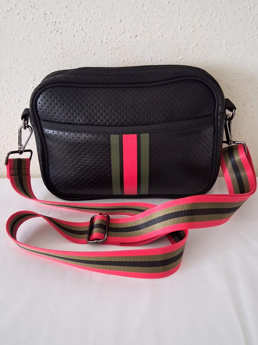 HAUTE SHORE Black Crossbody Bag with Olive Pink Stripes Strap